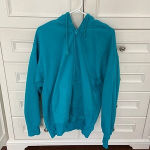 TNA Cozy Boyfriend Zip Up Hoodie. Size Medium. Blue/Turquoise colour.